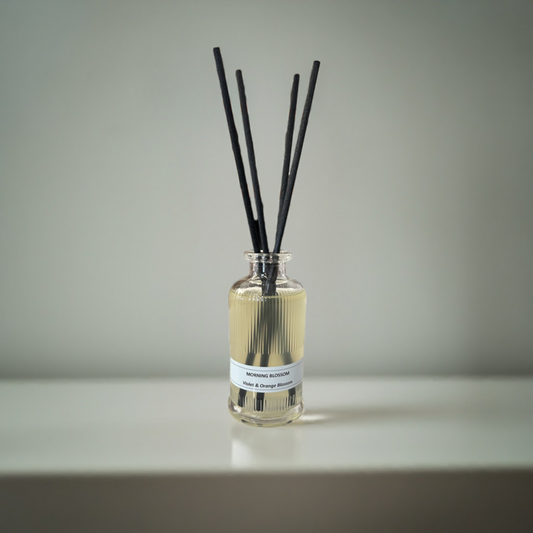 A reed diffuser with 4 reed sticks